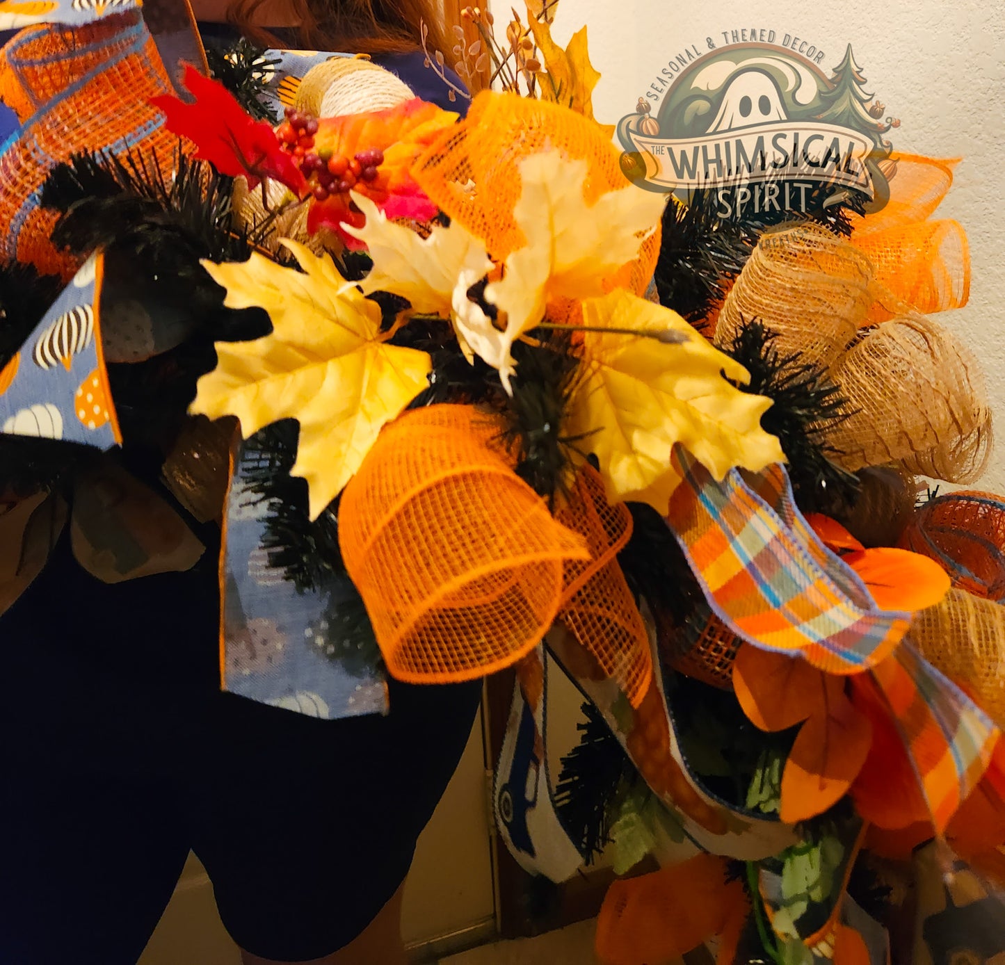 Decorative wreath with Fall-themed elements and 'Whimsical Spirit' branding.