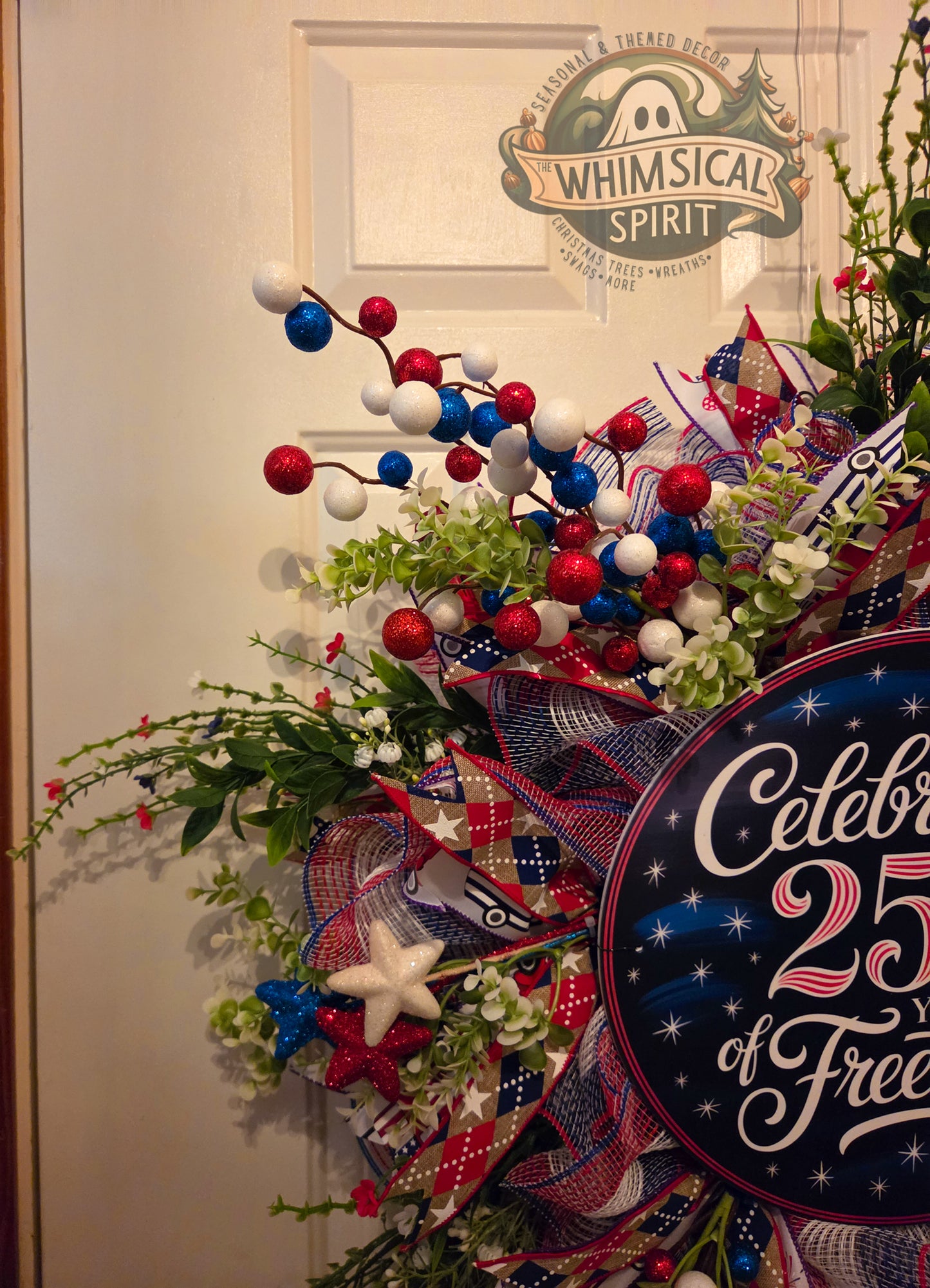 Decorative wreath with patriotic elements and 'Whimsical Spirit' branding.