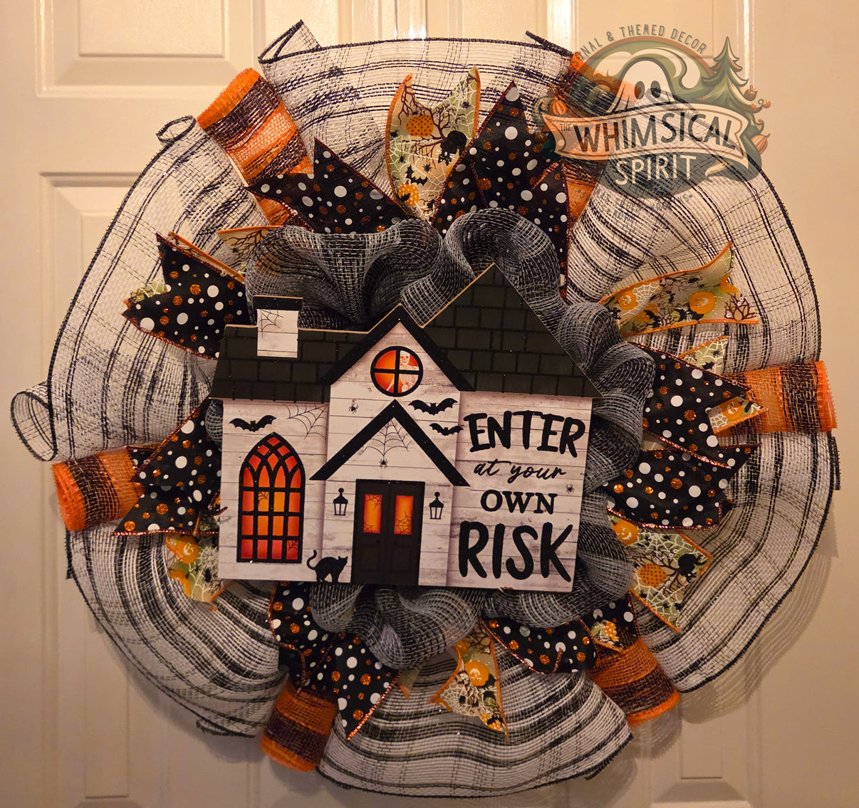 Knock If You Dare haunted-house Halloween mesh wreath with an Enter at Your Own Risk sign and orange, black, and white ribbons.