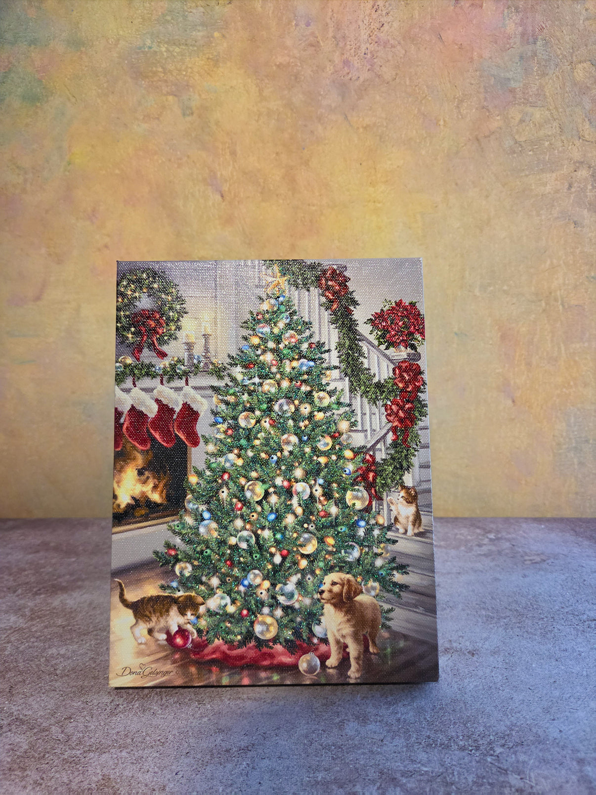Merry and Bright light-up Christmas tabletop canvas featuring a decorated Christmas tree, fireplace, stockings, puppies, cats, and festive holiday decor.