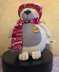 Patrick the Polar Bear winter soft sculpture shelf sitter with red knit hat, matching scarf, gray belly, name tag, and cozy polar bear details.