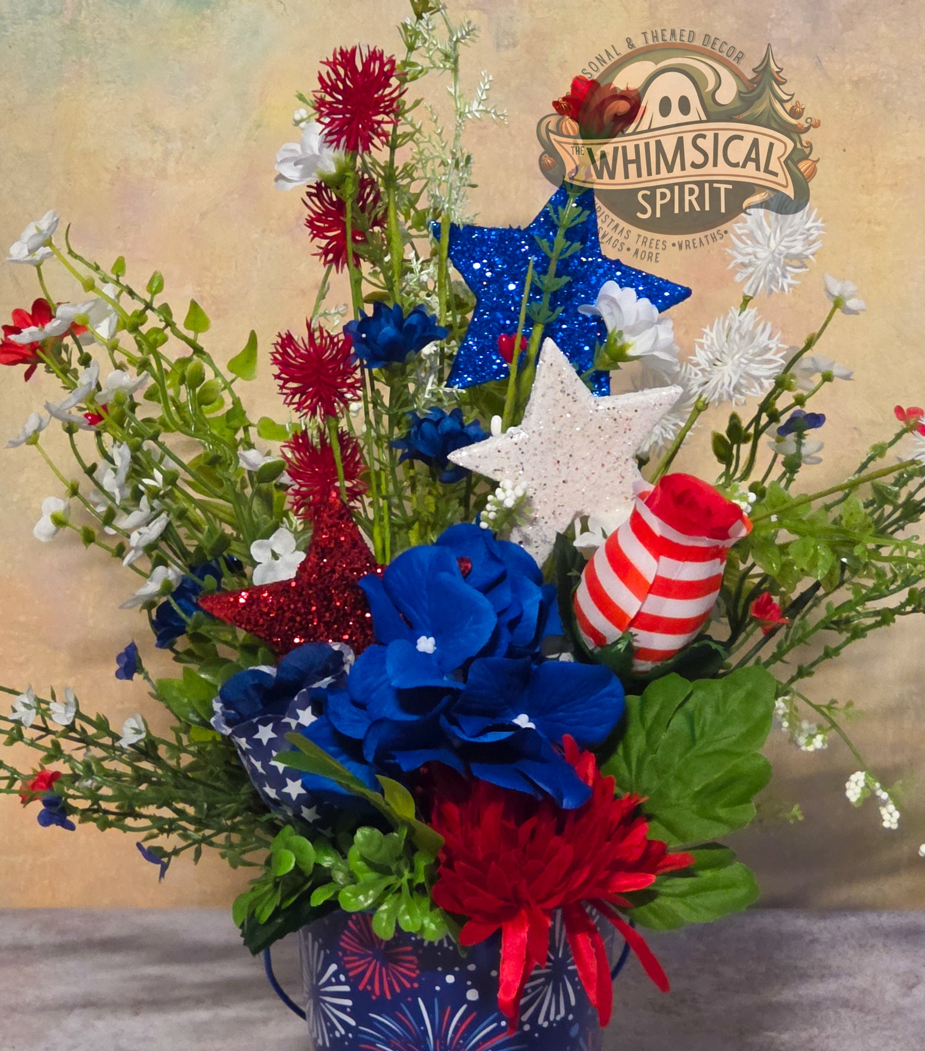 Bouquet with red, white, and blue flowers and stars on a textured background with 'Whimsical Spirit' branding.