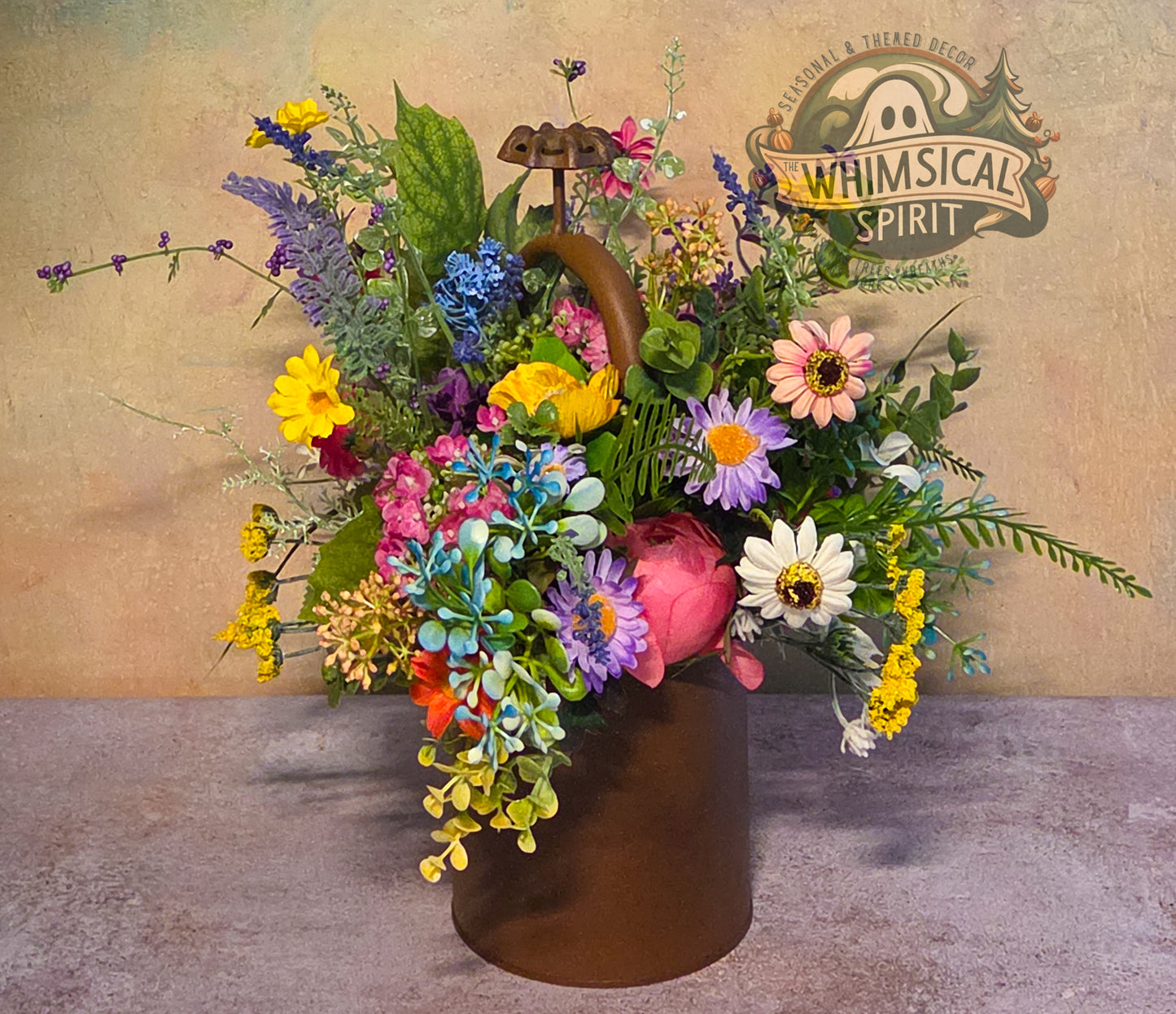 Colorful flower arrangement in a brown vase with 'Whimsical Spirit' logo in the background.