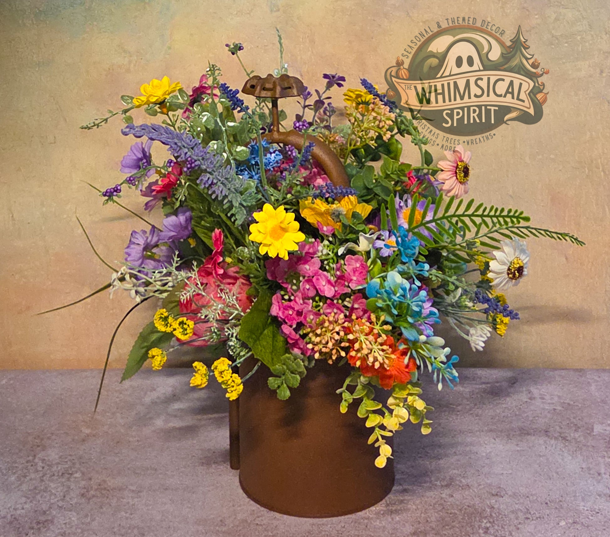 Colorful floral arrangement in a brown vase with 'Whimsical Spirit' logo in the background.