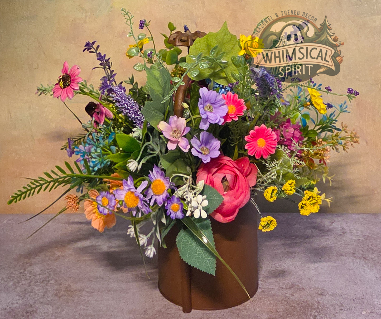 Colorful bouquet of flowers in a brown vase with 'Whimsical Spirit' branding in the background.
