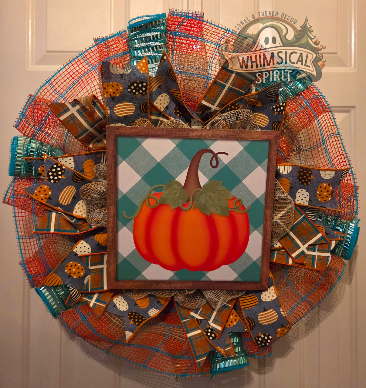 Plaid Pumpkin Parade teal fall mesh wreath with a framed pumpkin sign, layered plaid, and pumpkin-print ribbons.