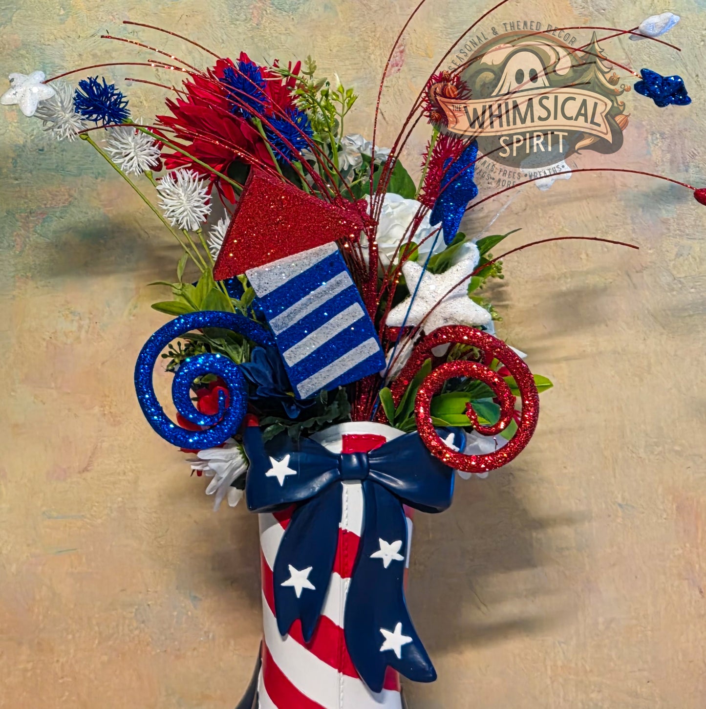 Decorative floral arrangement with American flag elements on a textured background