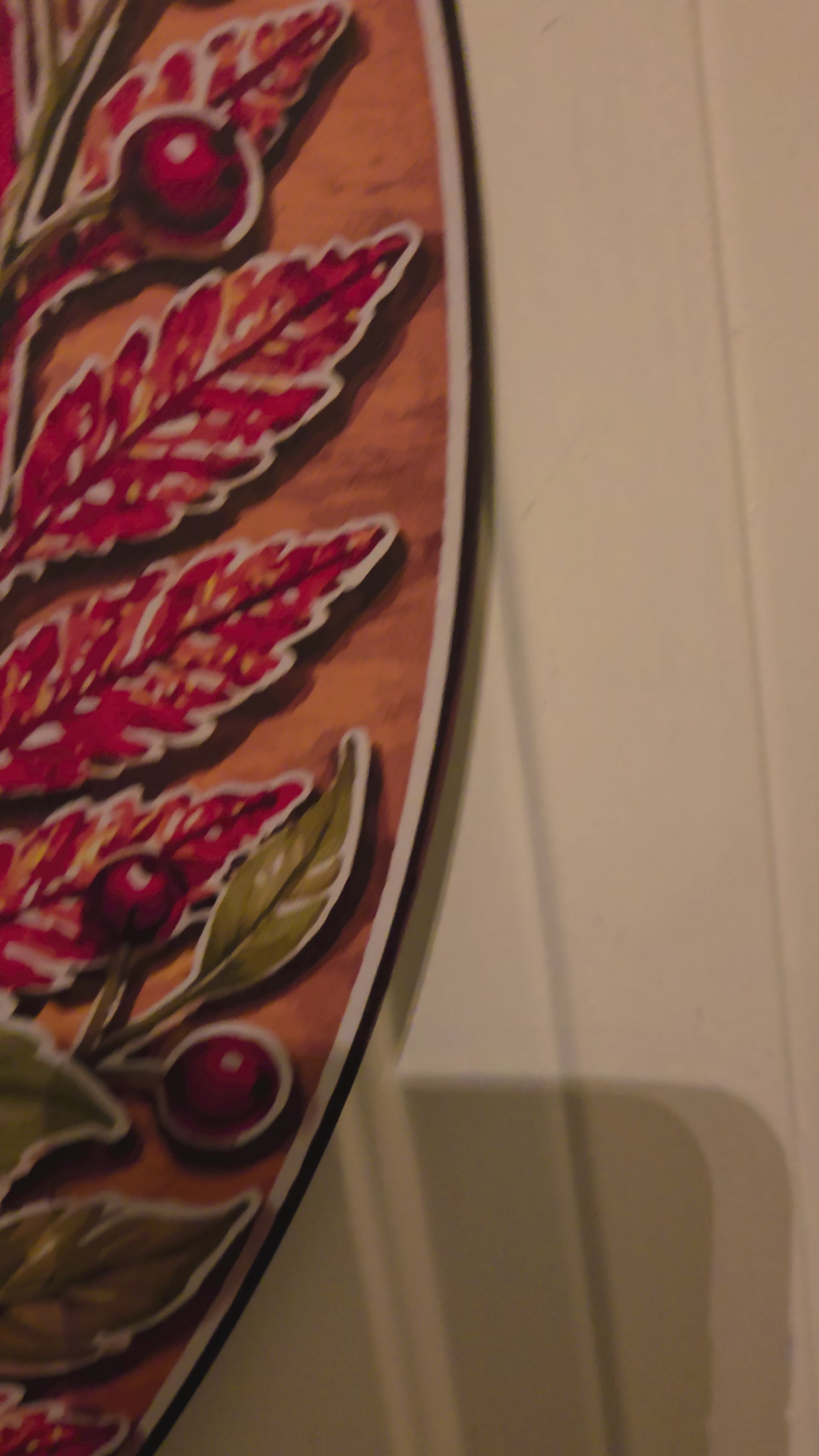 Video showing the Grateful & Golden fall door hanger, birch wood construction, pumpkin and sunflower artwork, plaid bow, and ribbon loop.