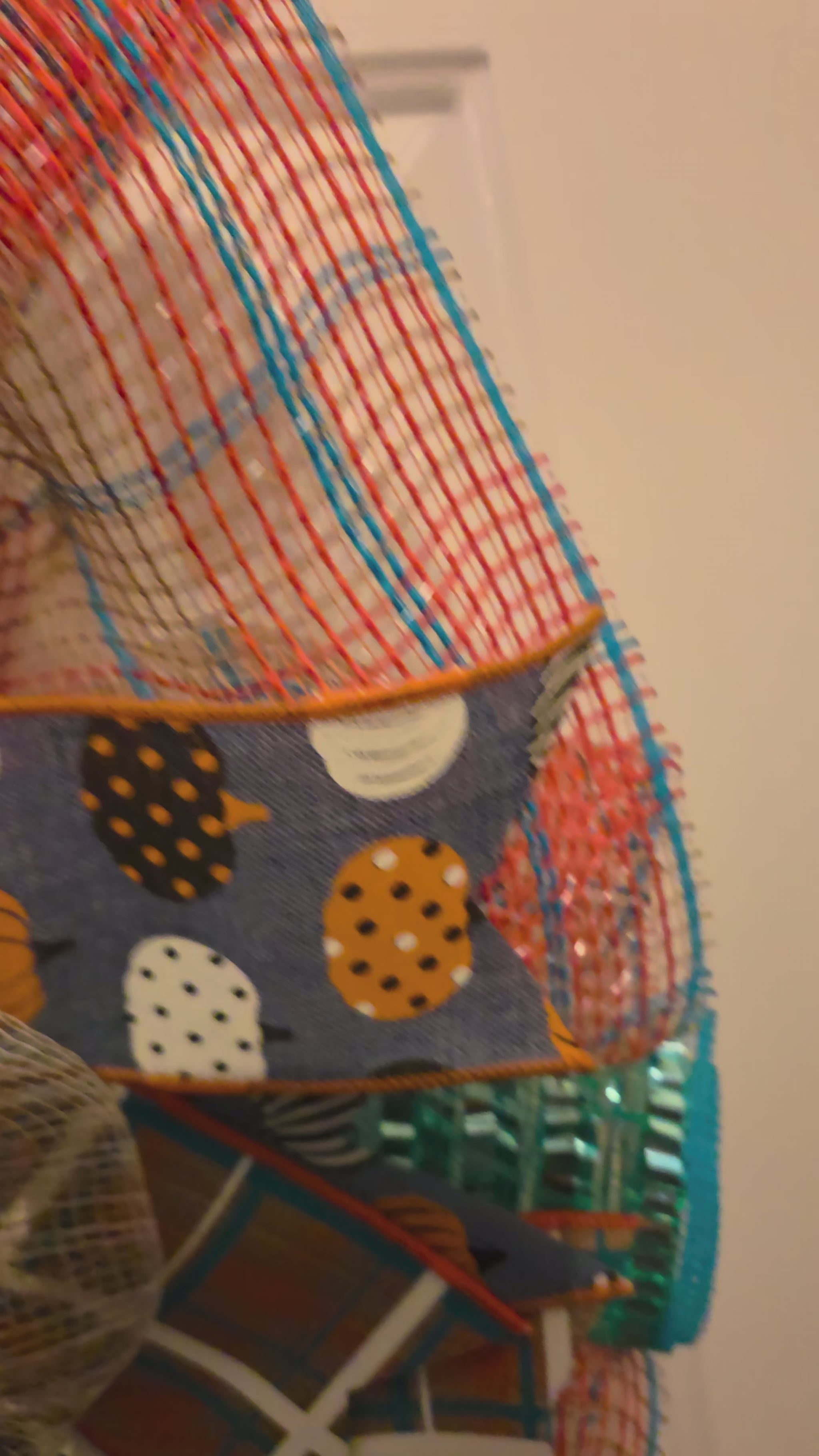 Video tour of the Plaid Pumpkin Parade wreath showing the framed pumpkin, layered mesh, and teal-and-orange ribbon details.