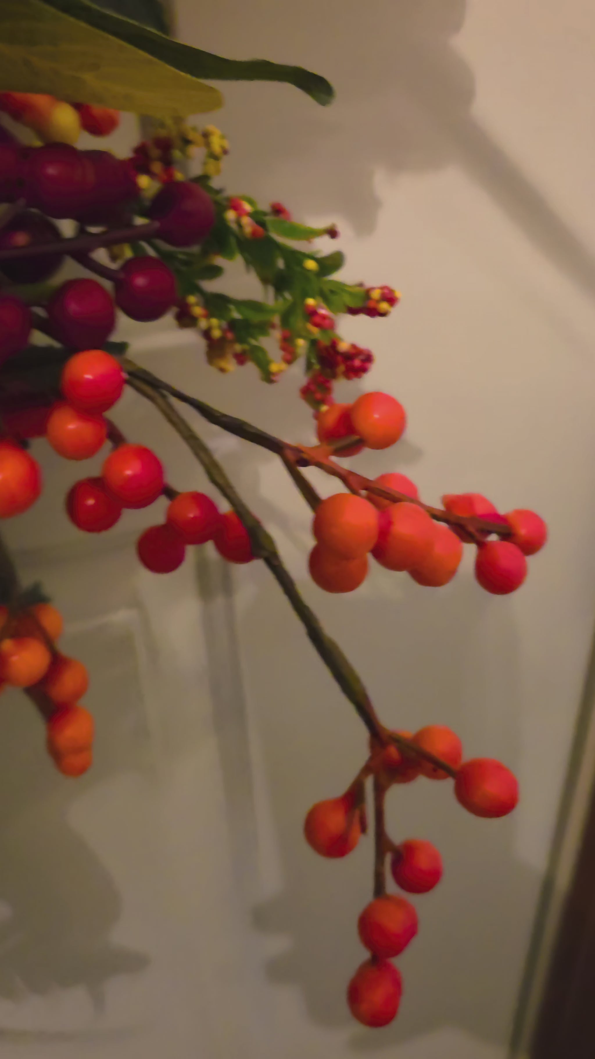 Video showcasing the full Pumpkin Patch Grandeur door swag and close-up details of its pumpkins, berries, flowers, greenery, and layered ribbons.