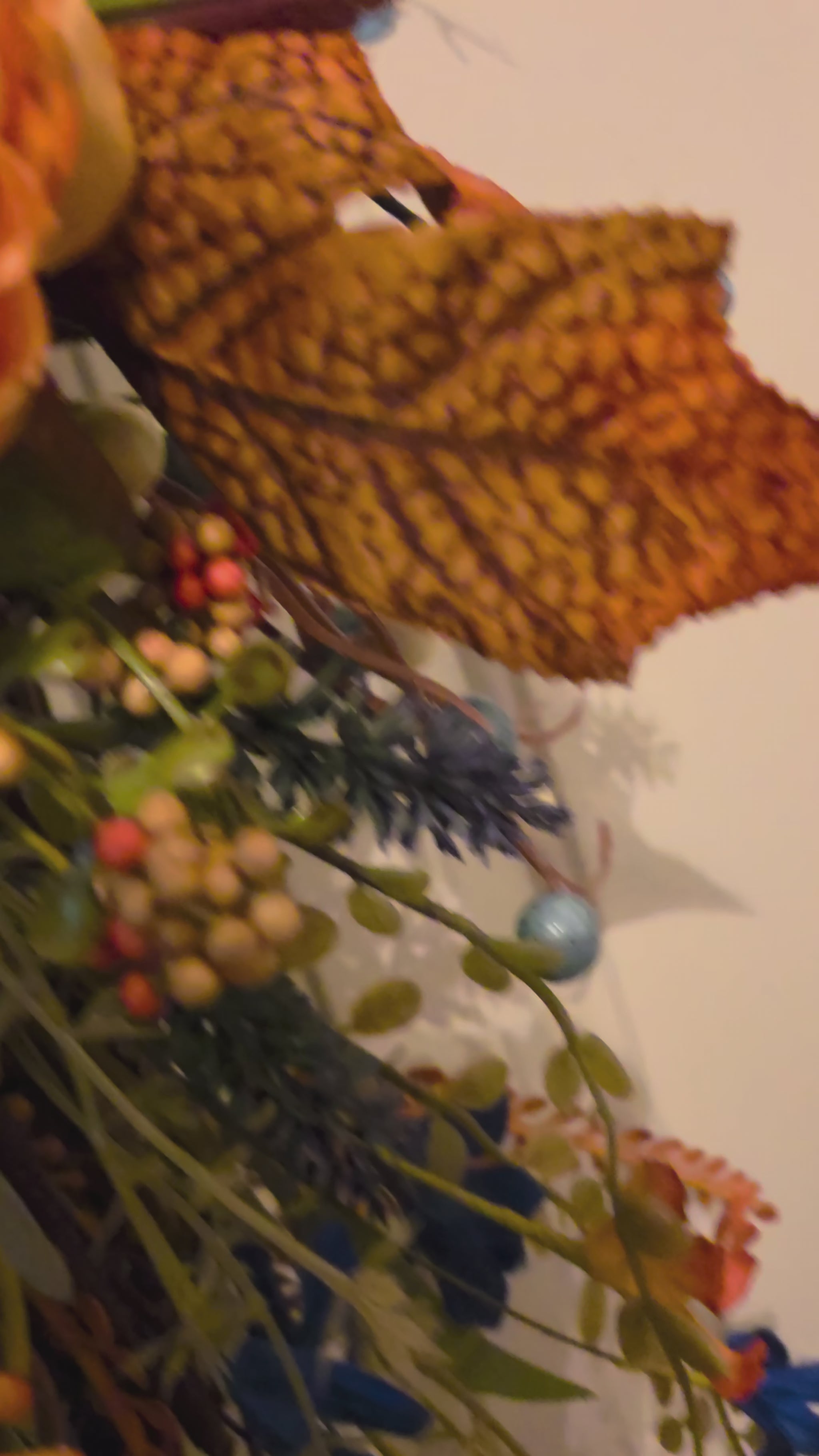 Video showcasing the blue pumpkin fall grapevine wreath, including its patterned bow, florals, and cascading details.
